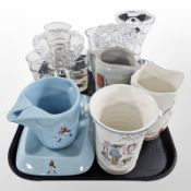 A Wade jug on stand, set of six Mackinlay's whisky glasses and further pottery jug,