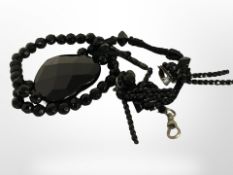 A group of Whitby jet including watch chain, pair of earrings, etc.