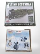 A Happy Feet child's Flik Flak Swatch Watch, together with a Flying Scotsman metal construction set,