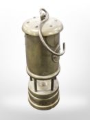 A Welsh brass musical miners lamp.