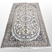 A Nain rug, Isfahan Province, Central Iran, 244 cm x 150 cm.