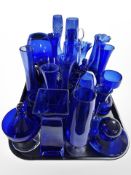 Quantity of blue glass vases, jugs,