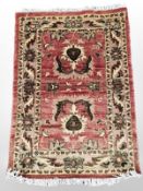 A rug of Zeigler design, 120 cm x 84 cm.