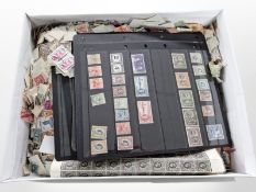 A box of many hundreds of mainly loose world stamps