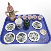 A polished onyx coffee pot and five matching cups, a silvered green glass vase, porcelain beaker,