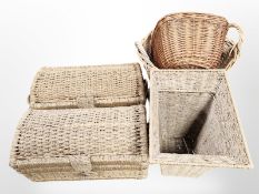 A pair of wicker domed lidded baskets, width 53 cm, plus three further baskets.