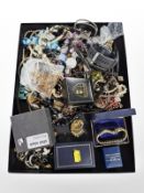 An assortment of costume jewellery, silver dress ring, wrist watch,