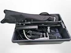 A group of musical equipment including collapsable music stand, angle poised clamp,