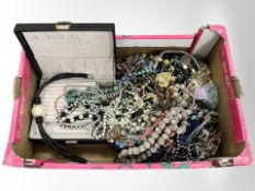 A box containing a very large quantity of costume jewellery, beads, necklaces, etc.