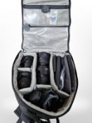 A Lowepro camera bag containing Canon Ultrasonic lens 28-135mm, Sigma Zoom 17-50mm lens,