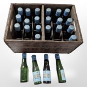 A vintage pine BabyCham crate containing twenty-four bottles of BabyCham sparkling perry