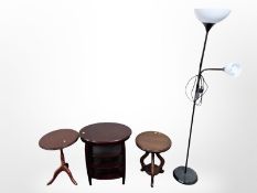 Three modern occasional tables and a standard lamp