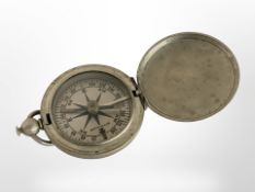 An American nickel-cased compass, possibly military.