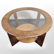 A G Plan teak glass top circular coffee table,