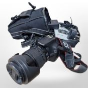 A Canon EOS 1200D digital camera, with Canon zoom lens EF-S 15-85mm in Cobra carry bag,