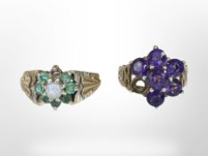 A 9ct gold opal and emerald cluster ring and a synthetic amethyst ring, both with stones deficient.