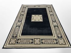 Two contemporary machine made carpets on black ground, 290 cm x 200 cm and 230 cm x 160 cm.
