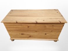 A modern pine blanket chest,