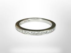 An 18ct gold diamond half eternity ring,