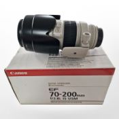 A Canon EF 70-200mm F-2.8L IS USM image stabiliser ultrasonic lens, with lens case and hood, boxed.