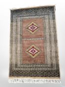 A Lahore Bokhara rug, Pakistan, 131 cm x 82 cm.