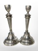 A pair of Edwardian silver candlesticks, Saunders and Shepherd, Birmingham 1908, height 20cm.