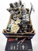 A toy robot, Thunderbirds chess set, dominoes, further toys and figures.