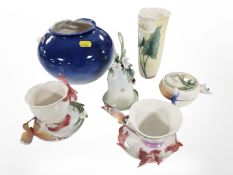 A Franz porcelain : floral porcelain bulbous vase, lidded preserve pot, hand bell,