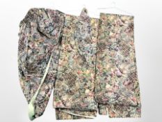 Two pairs of floral curtains with tiebacks.