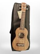 A Tanglewood ukulele, in soft carry case.
