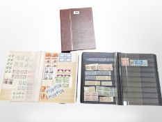 Three albums containing a collection of World stamps