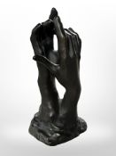 A resin sculpture after Rodin, height 12 cm.