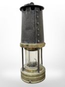 An antique miner's lamp.