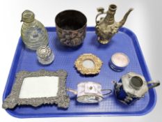 A 19th century Indian embossed copper pot, an Art Nouveau style pewter photograph frame,