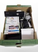 An Xbox 360 and two Nintendo Wii consoles, controllers and various games.