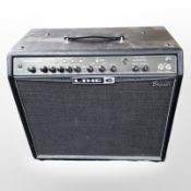 A Line 6 spider valve 112 amplifier, with lead.