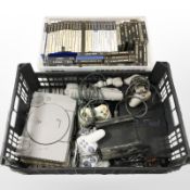 Two Sony Playstation 1 consoles, PS2 console, various controllers, Playstation pistol,