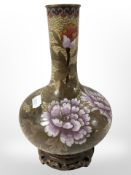 A 20th century cloisonne enamelled vase on turned hardwood stand,