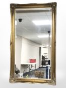 A Victorian style gilt over mantel mirror 130 cm x 75 cm