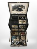 A contemporary jewellery box containing assorted silver and costume jewellery, including earrings,