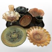 A group of carnival glass bowls and two beakers