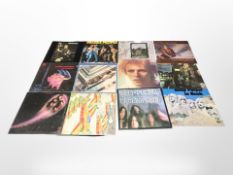 Twelve vinyl LP records, including David Bowie, Deep Purple, Rod Stewart, The Beatles, Suzi Quatro,