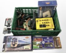 A quantity of rolling stock, Hornby digital control unit, Bachmann E-Z command train control center,
