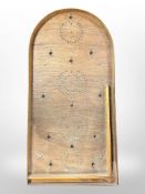 A bagatelle board,