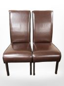 A pair of contemporary leather dining chairs