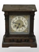 A Victorian oak eight day bracket clock with silvered dial,