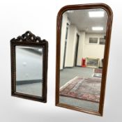 An antique style bevelled mirror, 52 cm x 87 cm, together with a further 19th century mirror.