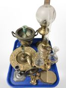 Two brass and glass oil lamps, gilt metal bottle stand, brass and pewter candlesticks jardiniere,