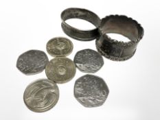 Two silver napkin rings, three commermorative two pound coins and three fifty pence coins.