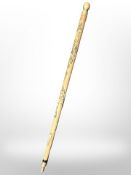 A vintage combination walking stick snooker cue, with brass mounts.